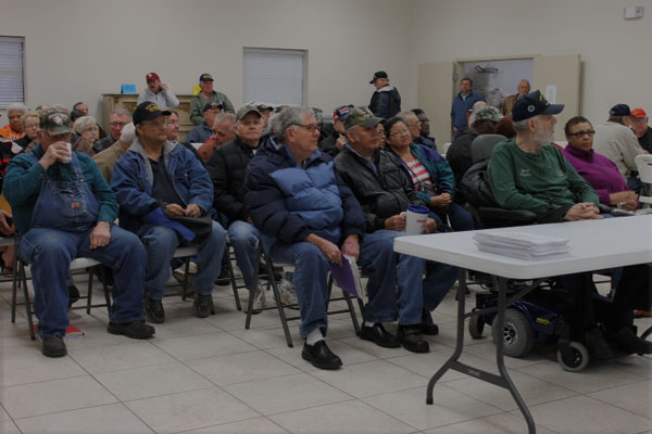 Veterans wait to talk to a volunteer at the Goldsby Community Center in Goldsby, Oklahoma. (Photo by Kelsey Hightower, News21)